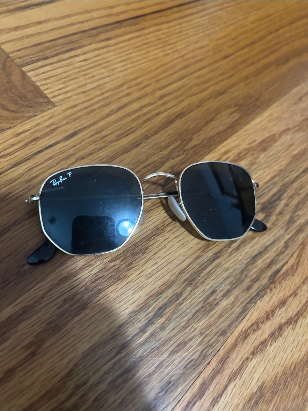 Ray-Ban Sunglasses in Black and Gold Hexagonal Frame